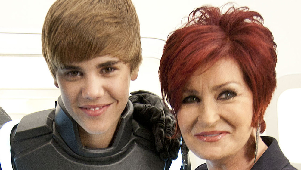 Justin Bieber and Sharon Osbourne smiling  