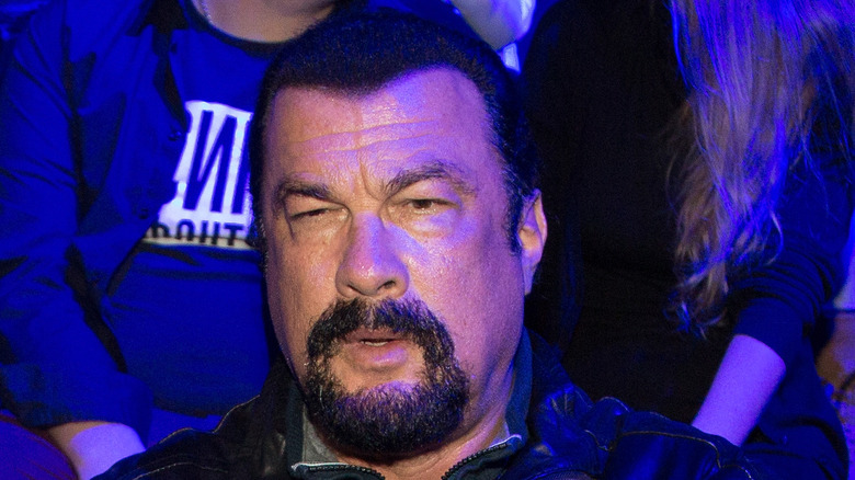 Steven Seagal with goatee squinting