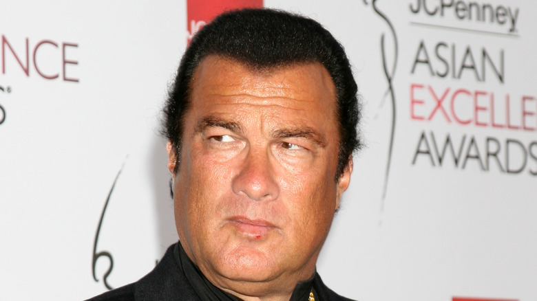 Steven Seagal sullen on red carpet