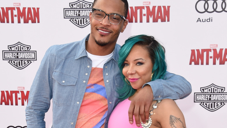 T.I. and Tiny smiling together