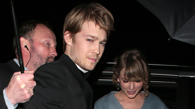 Joe Alwyn with Taylor Swift smiling