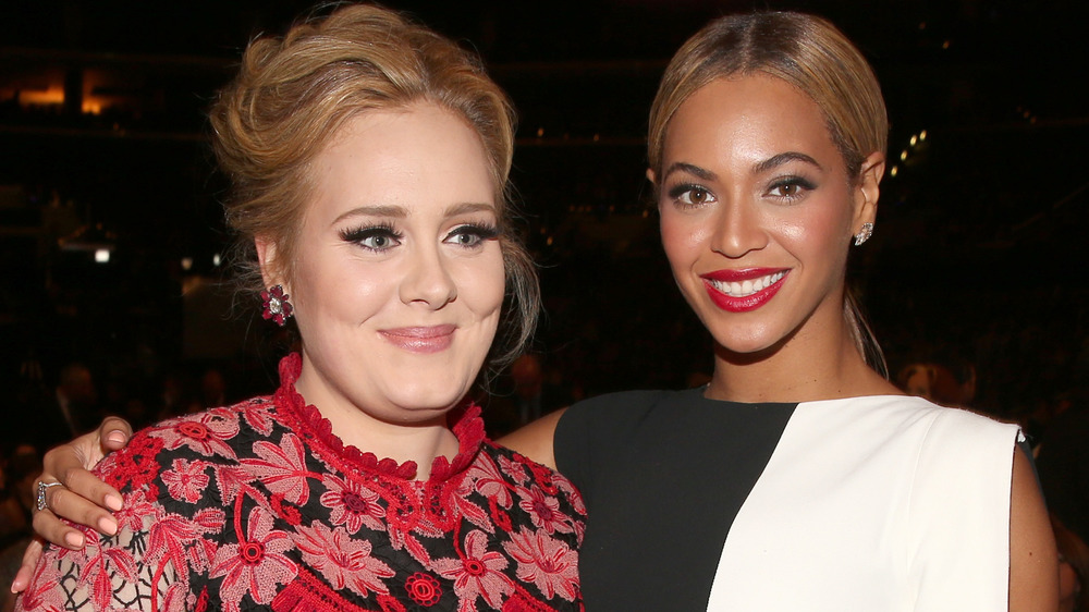 Beyonce and Adele, arm in arm and smiling