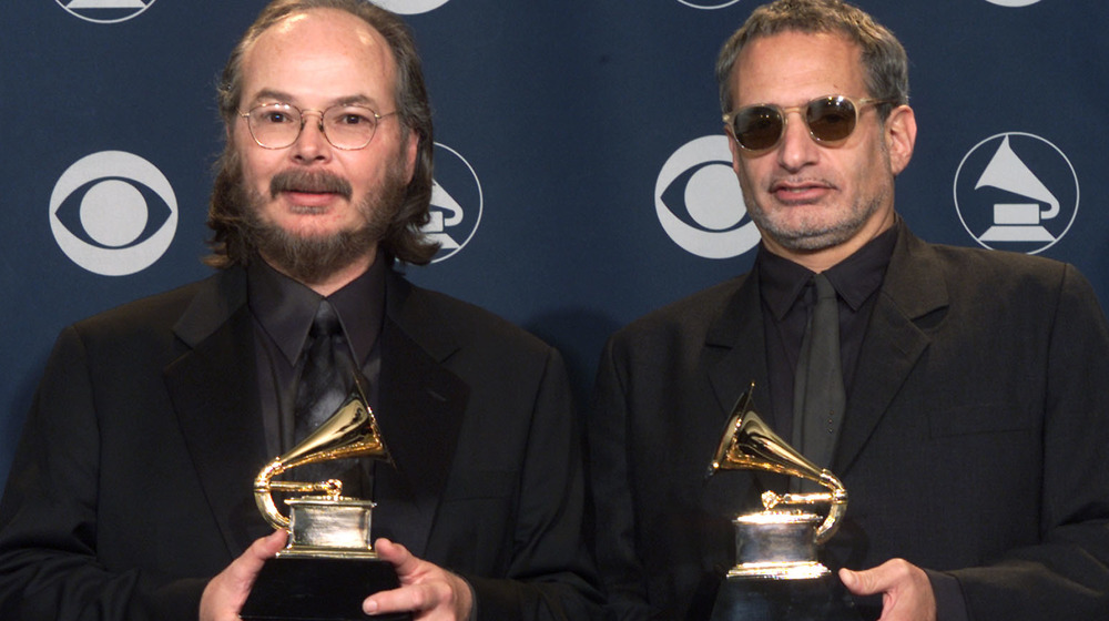 Donald Fagen and Walter Becker of Steely Dan holding Grammys