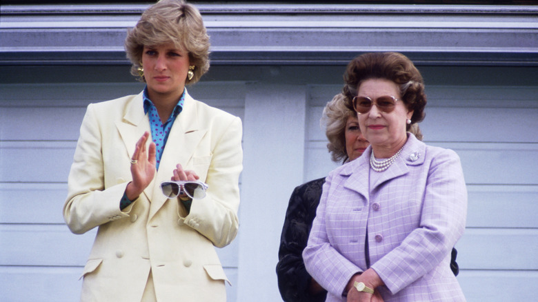 Princess Diana and Queen Elizabeth, both looking stern