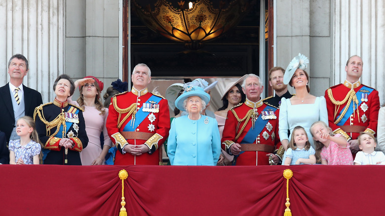 The royal family on the balcony of Buckingham Palace, looking upwards 