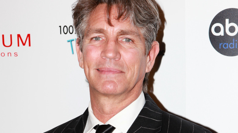 Eric Roberts posing