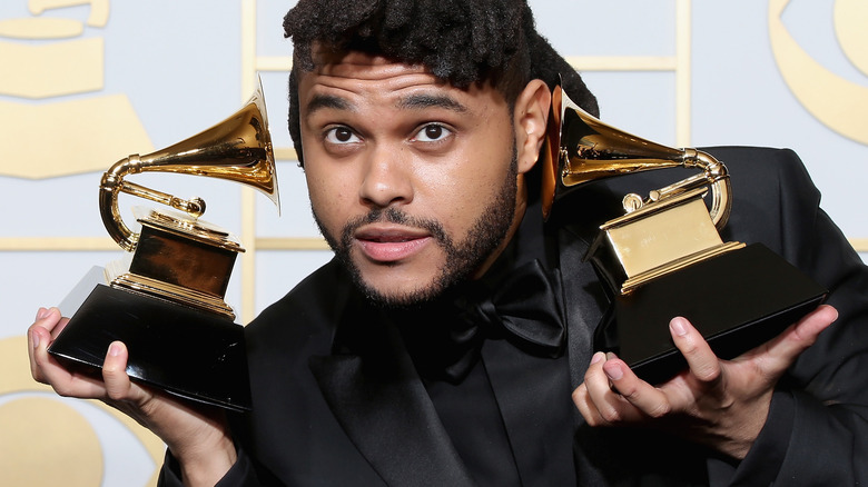 The Weeknd holding Grammy Awards