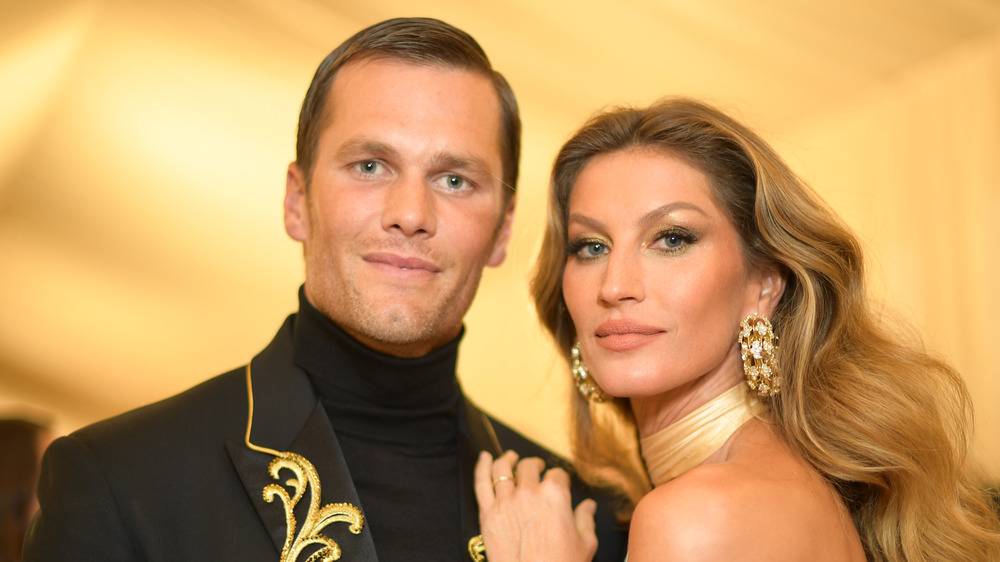 Tom Brady and Gisele Bundchen hugging at the Met Gala