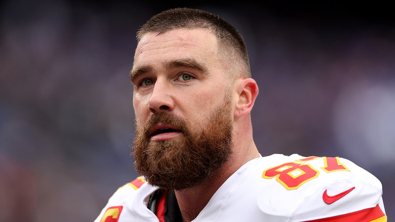 Travis Kelce on football field in close-up