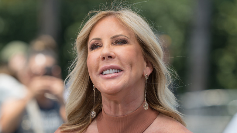 Vicki Gunvalson looking up and smiling