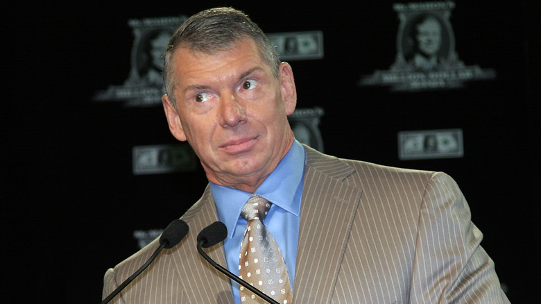 Vince McMahon listening