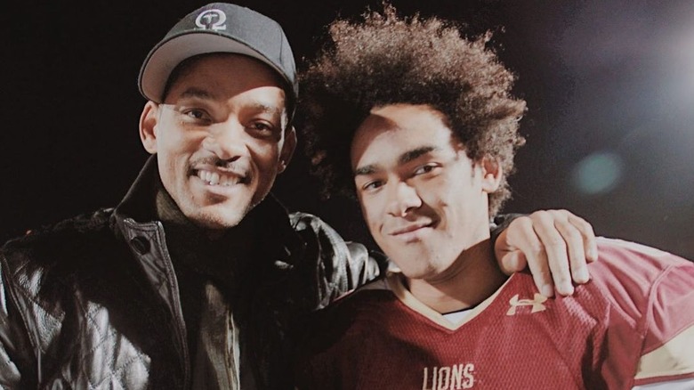 Will Smith with arm around son Trey