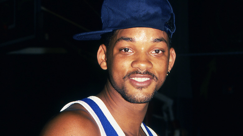 Will Smith in blue hat