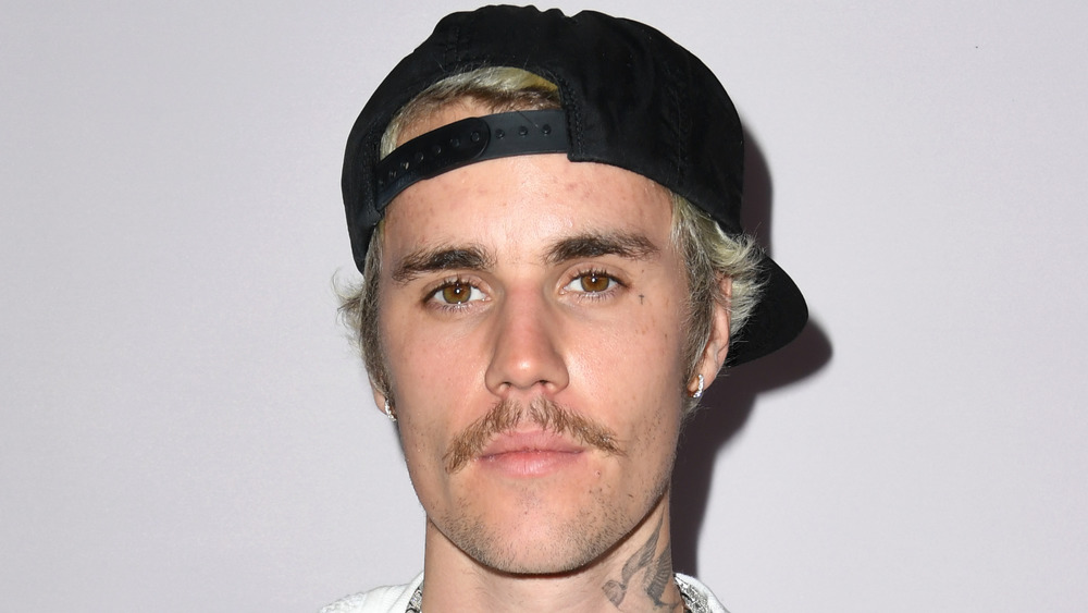 Justin Bieber with scant moustache