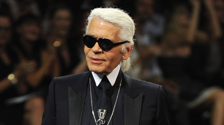 Karl Lagerfeld in silver necklace