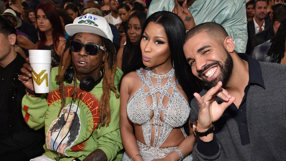 Lil Wayne holding drank with Nicki Minaj and Drake