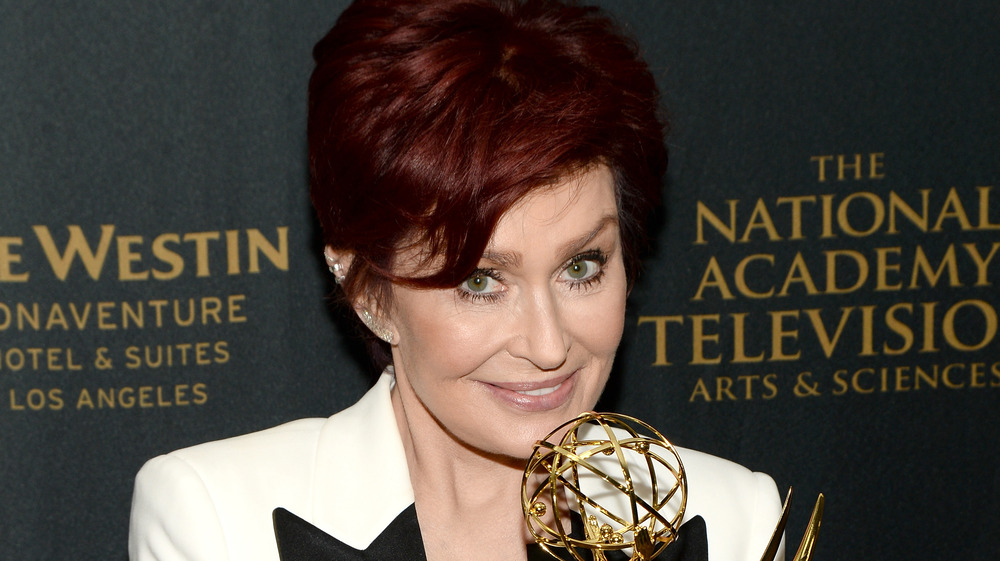 Sharon Osbourne holding Emmy