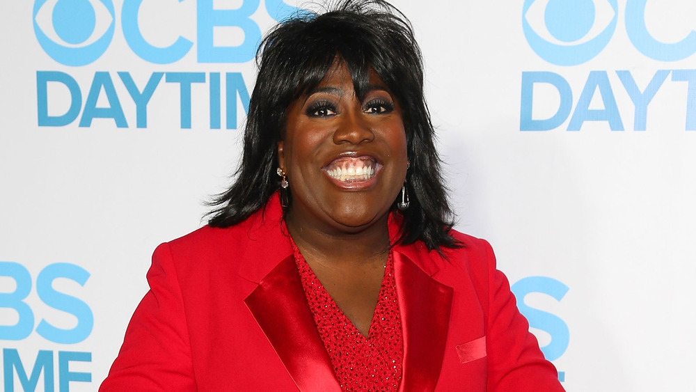 Sheryl Underwood wearing red blazer