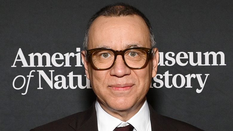 Fred Armisen slightly smiling black tie event