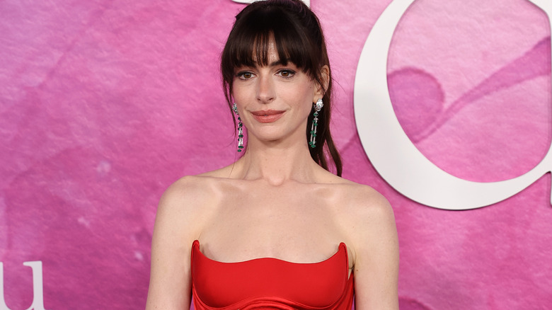 Anne Hathaway wearing a red dress