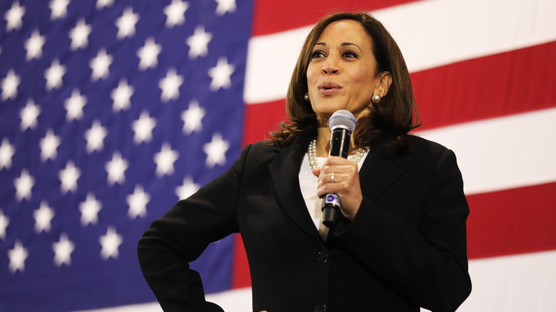 Kamala Harris smiling US flag