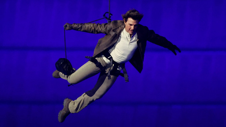 Tom Cruise dangling in air