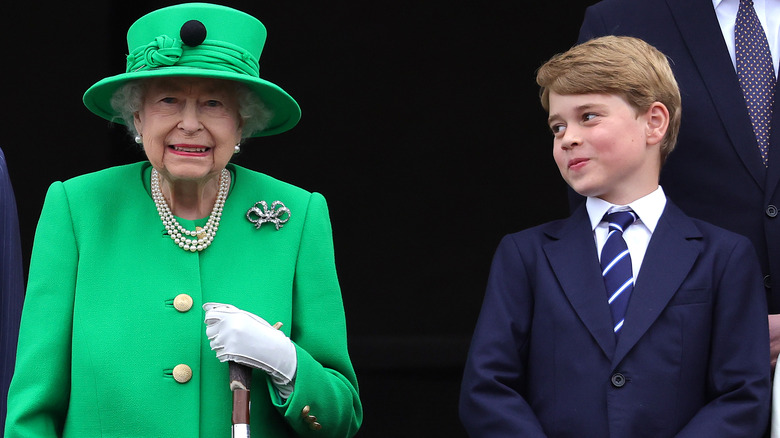 Prince George looking at Queen Elizabeth II