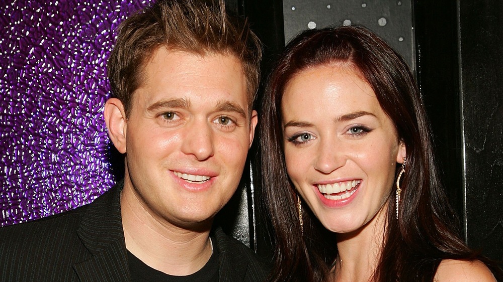 Emily Blunt and Michael Bublé smiling at an event