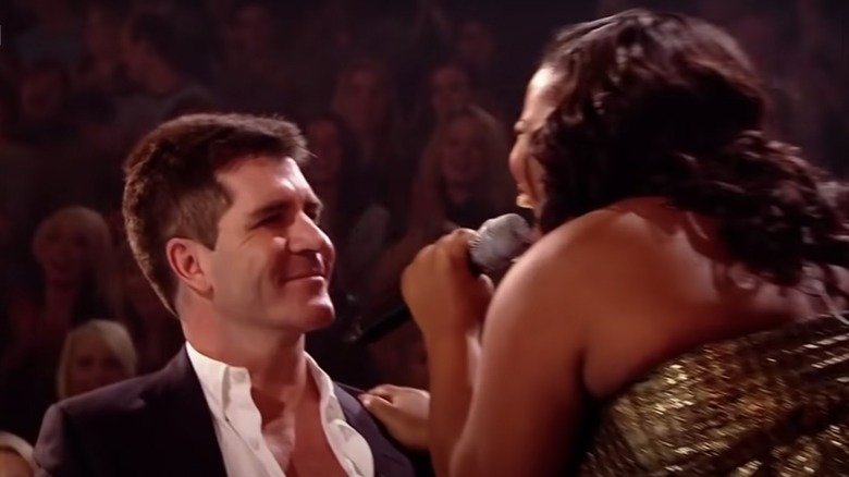 Simon Cowell and Amber Riley