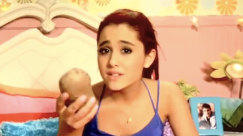 Ariana Grande holding a potato