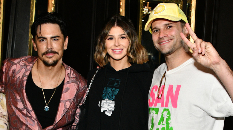 Tom Sandoval, Raquel Leviss, and Tom Schwartz smiling