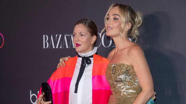 Drew Barrymore and Chloe Fineman pose on the red carpet