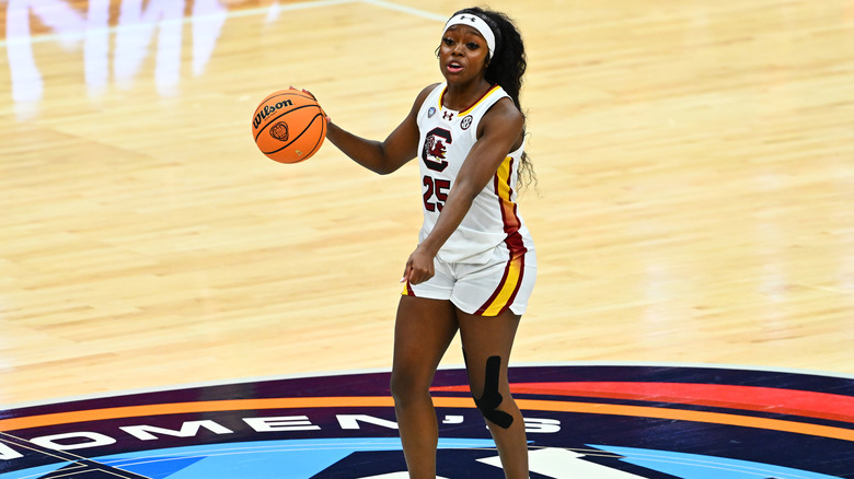 Raven Johnson holding a basketball