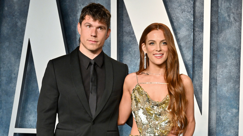 Ben Smith-Petersen and Riley Keough posing