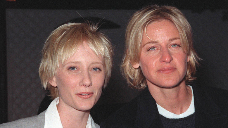 Anne Heche and Ellen DeGeneres pose together in 1999