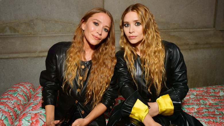 Mary-Kate and Ashley Olsen smiling