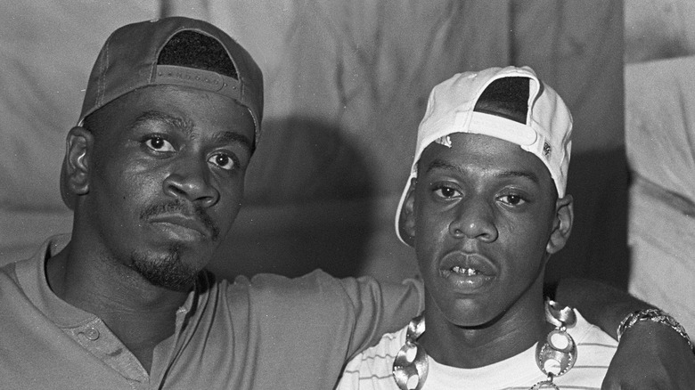 Jaz-O and Jay-Z wearing baseball caps