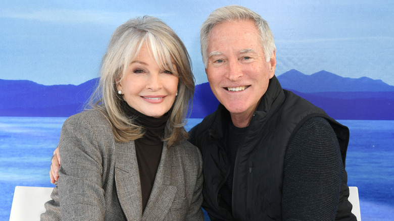 Deidre Hall and Drake Hogestyn posing at an event