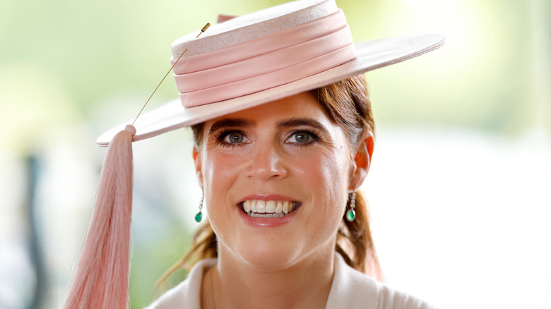 Princess Eugenie wearing a pink hat