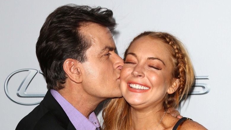 Charlie Sheen kissing Lindsay Lohan