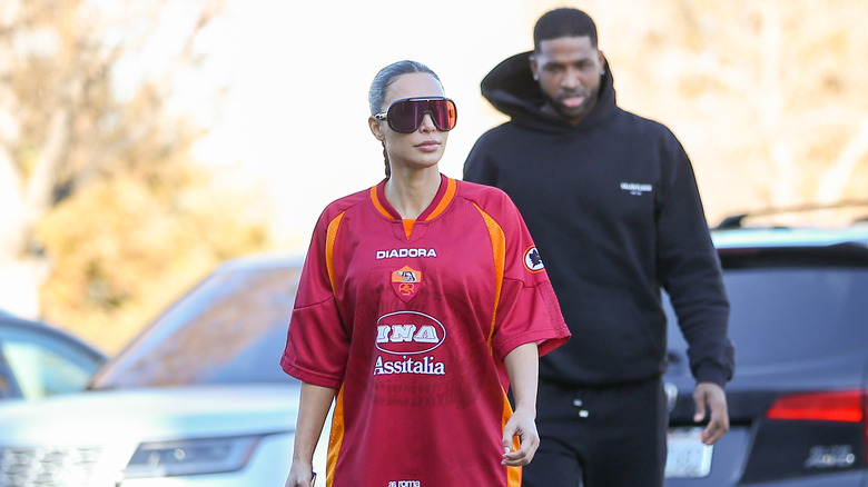 Kim Kardashian and Tristan Thompson walking