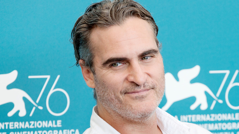 Joaquin Phoenix smirking 