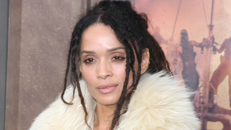 Lisa Bonet wearing fur boa 