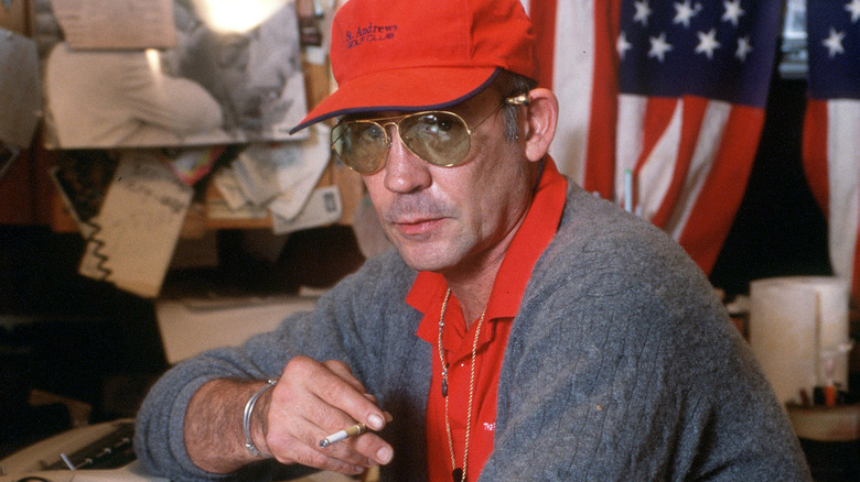 Hunter S. Thompson in front of American flag