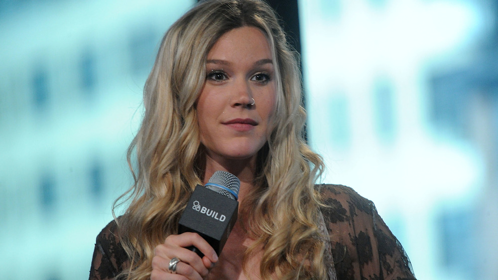 Joss Stone holding a microphone