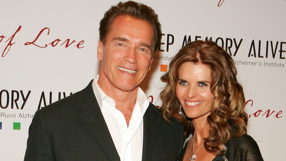 Arnold Schwarzenegger and Maria Shriver smiling 
