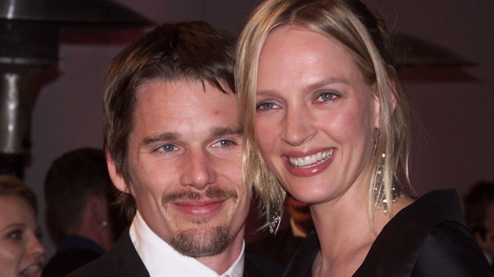 Ethan Hawke and Uma Thurman smiling cheek to cheek