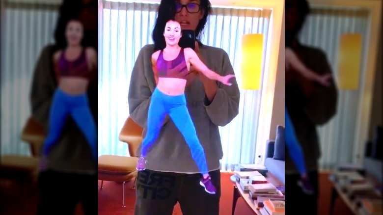 Demi Moore working out with a smart mirror