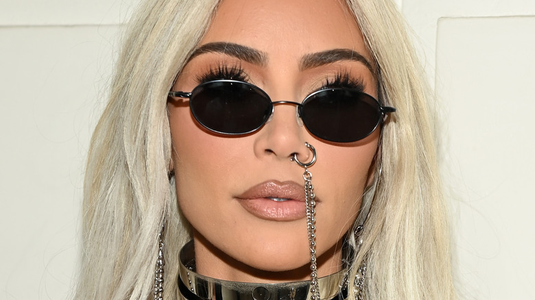 Kim Kardashian wearing glasses, nose ring