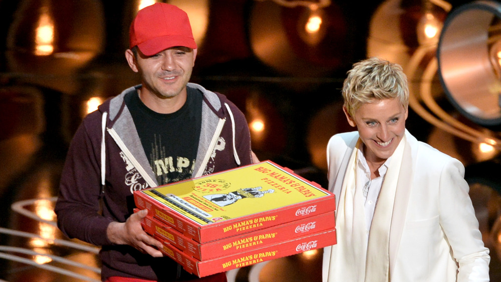 Ellen DeGeneres on Oscars stage with pizza man 